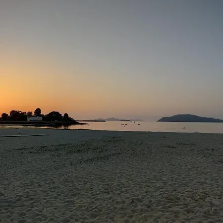 Con Jardin Frente A La Playa شقة بايونا